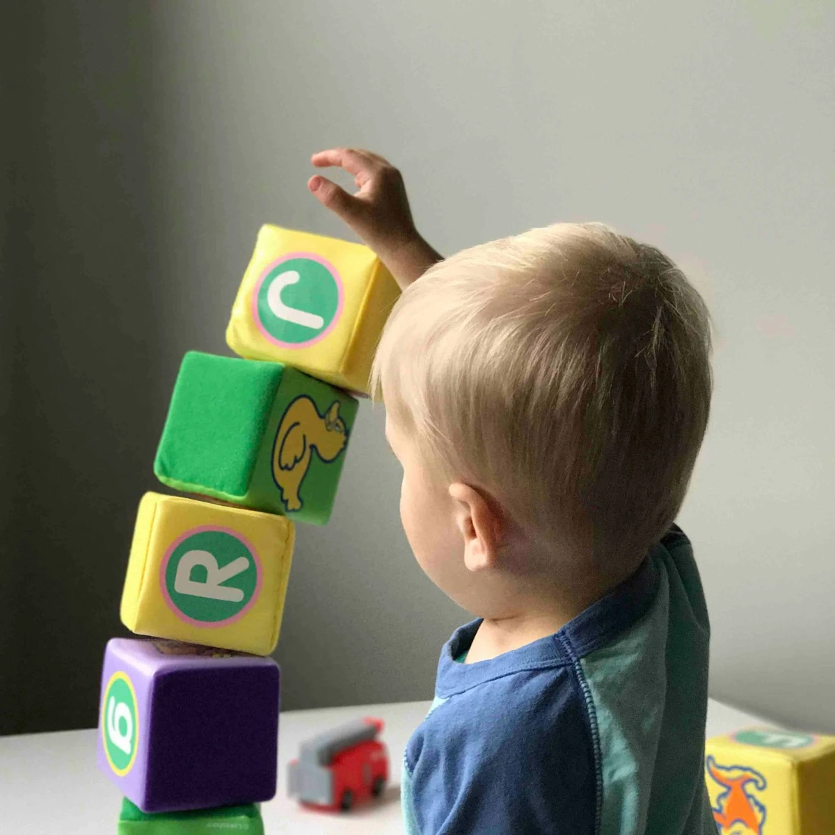 Toddler stacking letter blocks